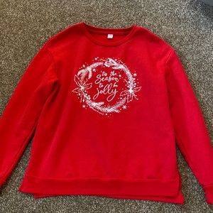 It is a sweater, size Small, brand is Holiday Time, and it is red and white.